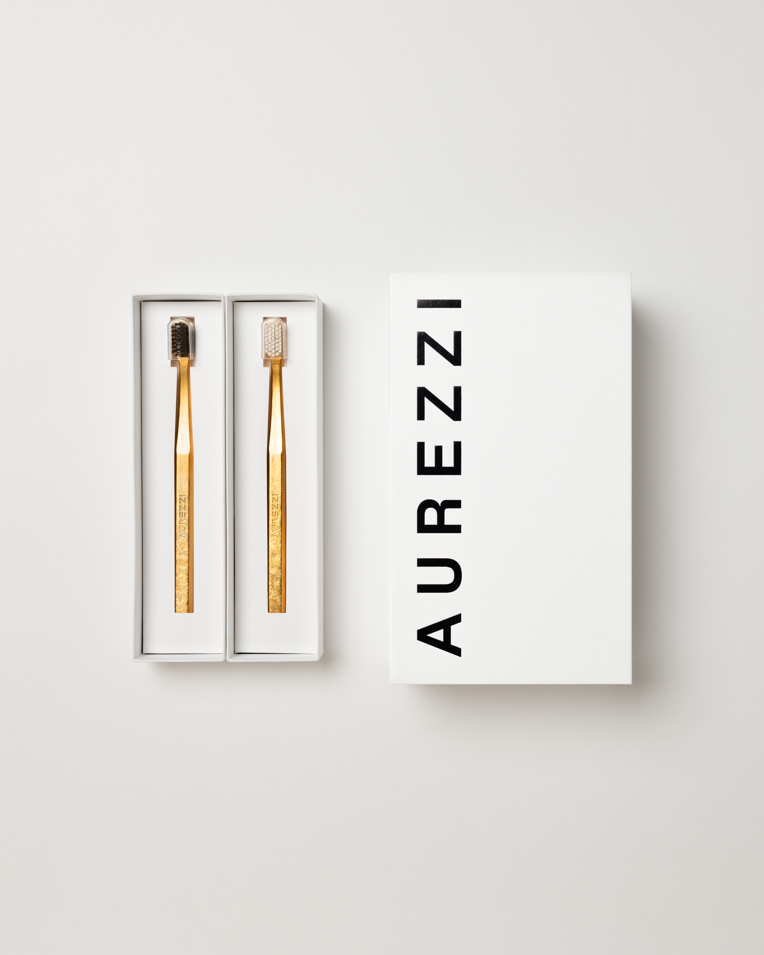 aurezzi-toothbrush-his-her-kit-24k-gold-zahnb-rsten-2er-set-gold-schwarz-gold-we image 1