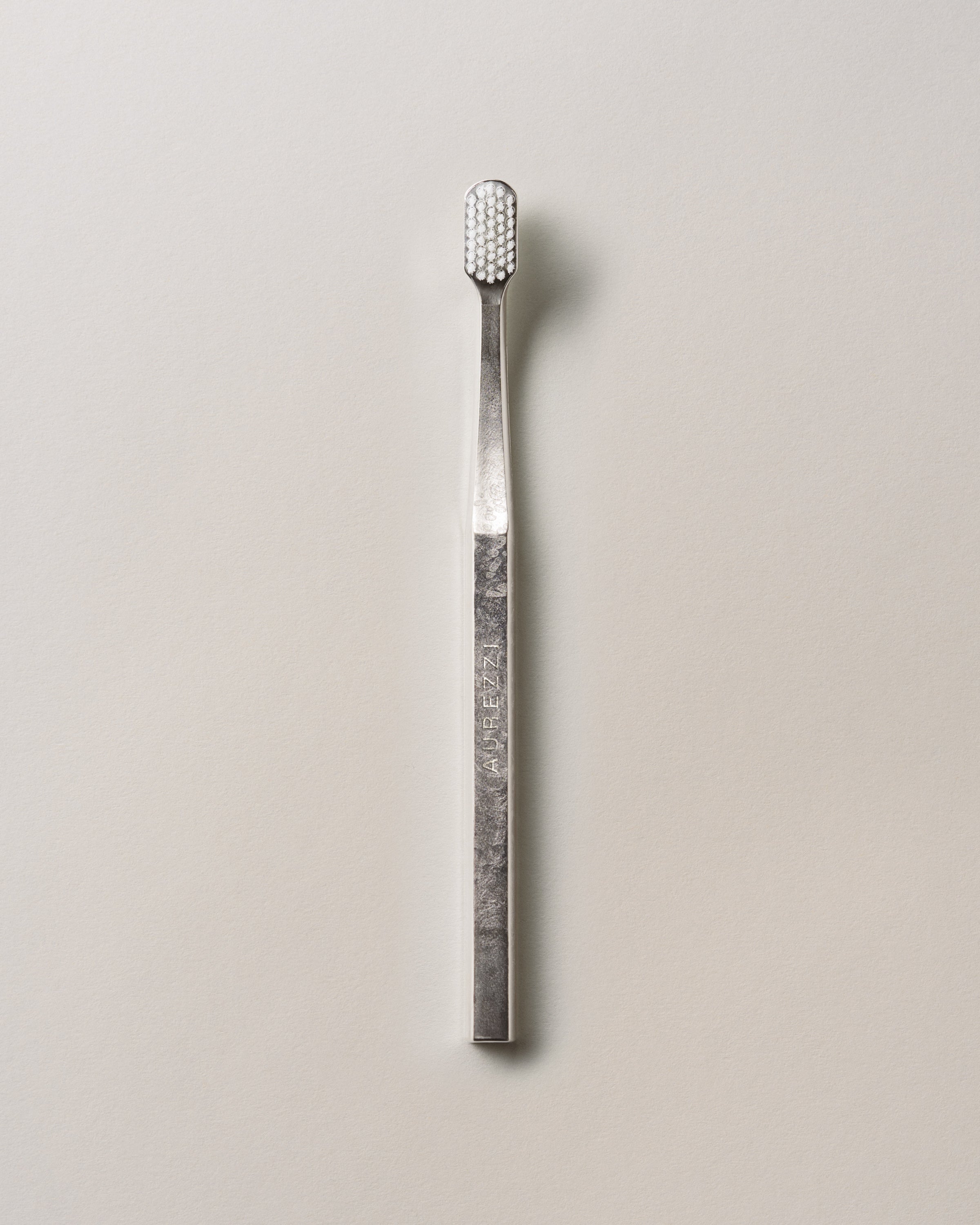 aurezzi-toothbrush-silver-white-zahnb-rste image 1