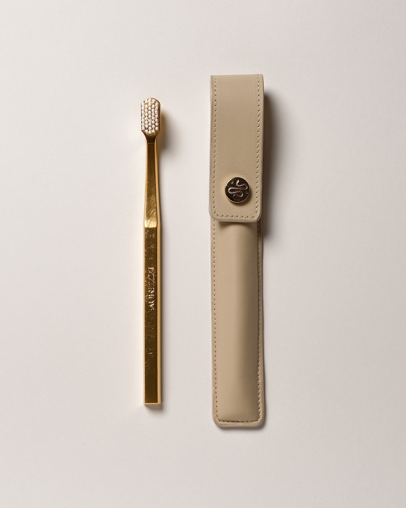 aurezzi-lederetui-button-beige-zahnb-rste-gold-white-set image 1